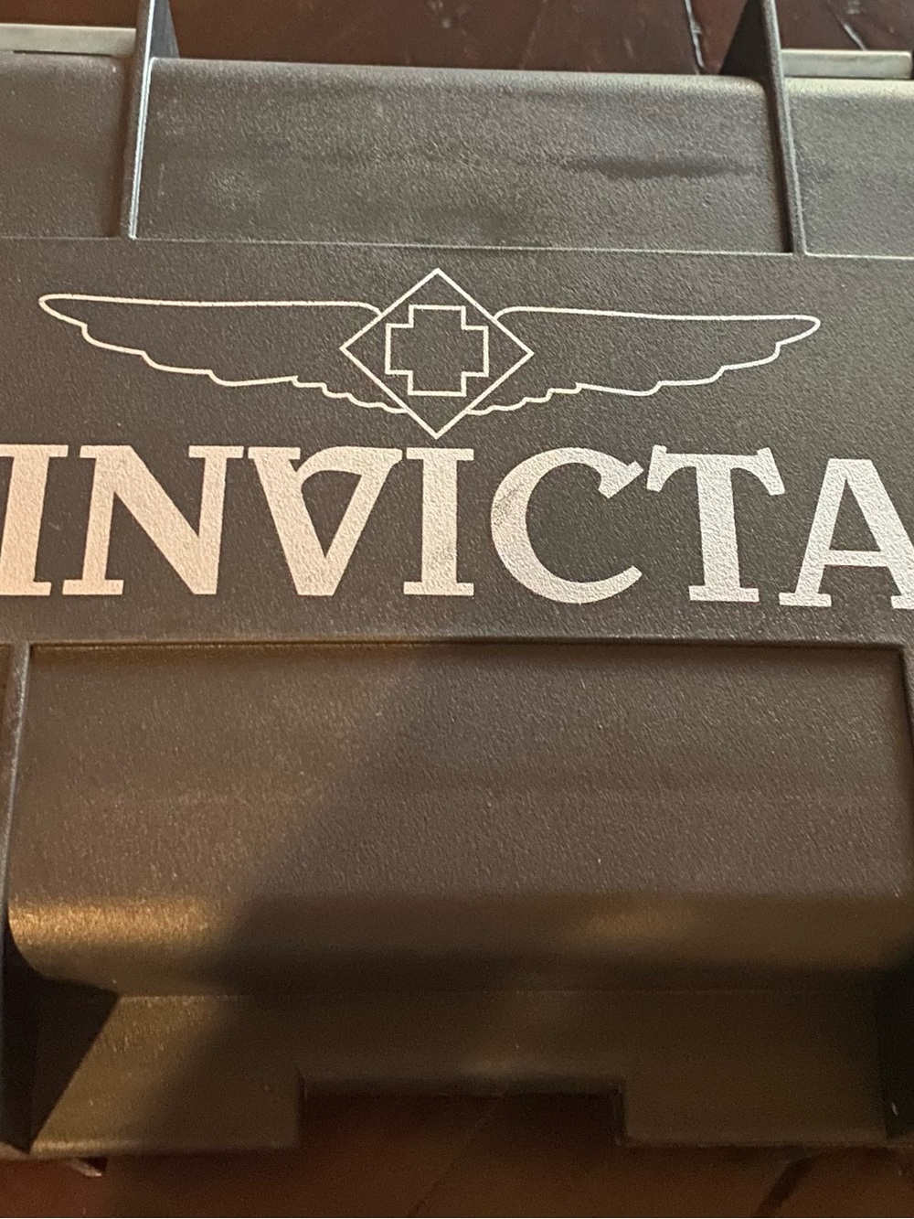 Invicta Black and White Logo Watch Case
